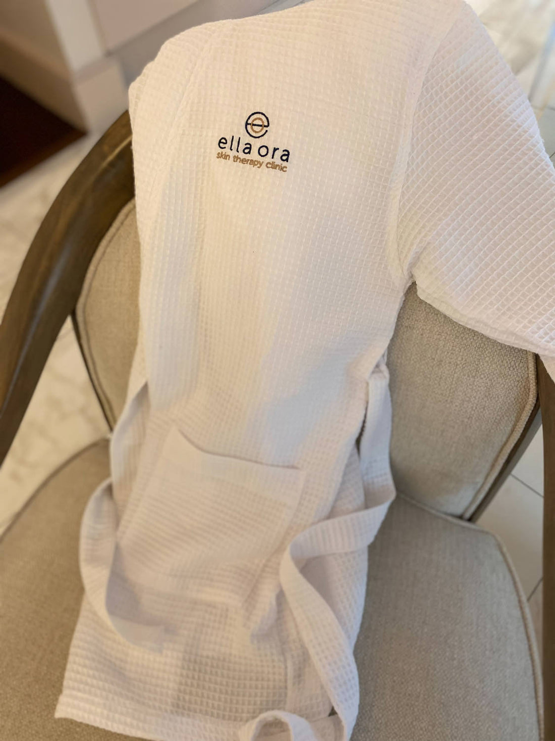 Ella Ora Robe laying on a chair