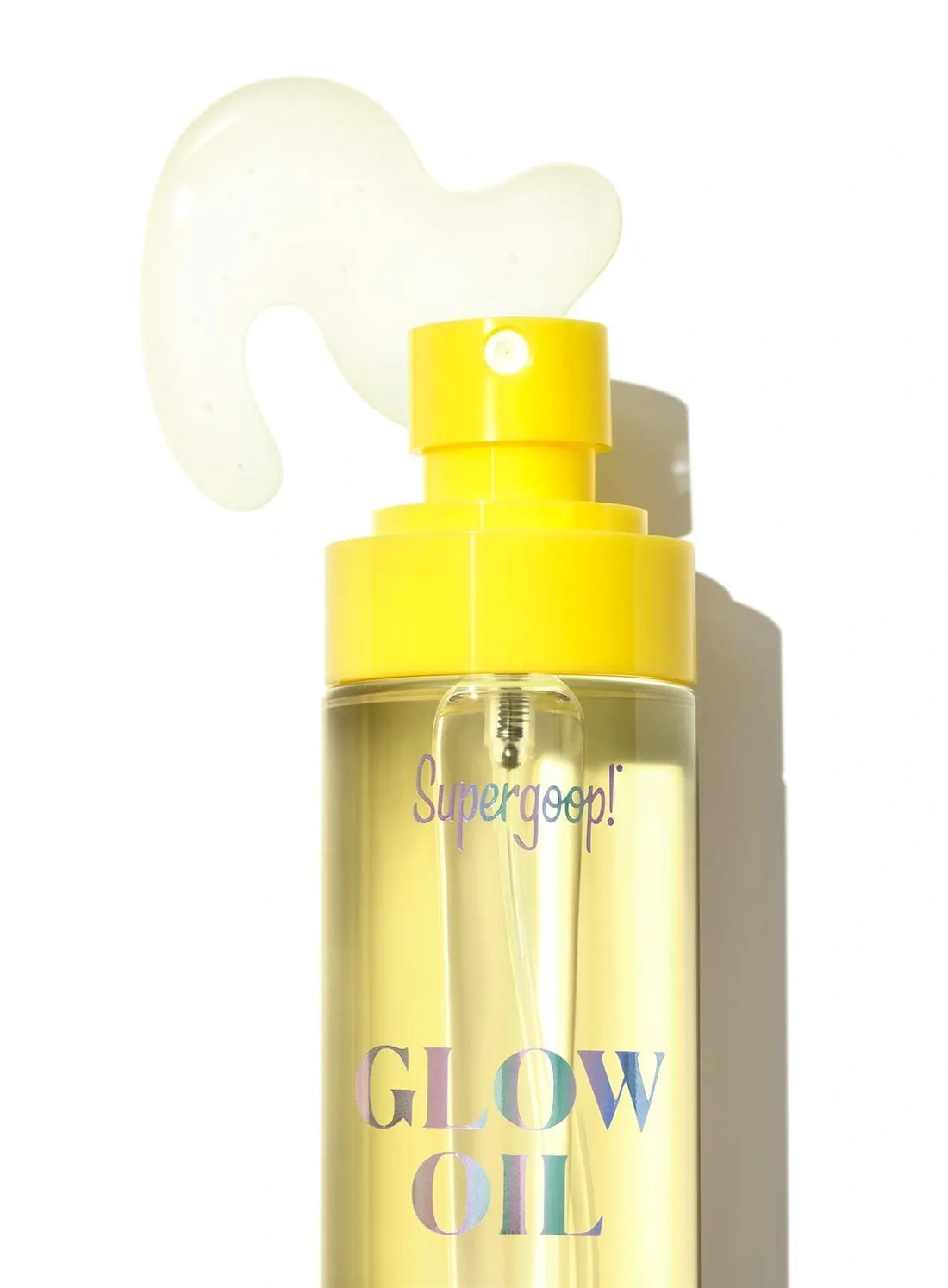 Supergoop Glow Oil SPF 50 bottle with some spilling out